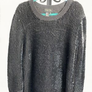 Gardy brand. Black sequin sweater-like top. Mid length. Heavyweight.